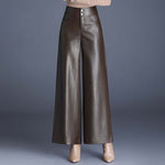 Women's high-waist PU leather wide-leg trousers by Yeha Maison, shown on a model with a stylish, modern fit.