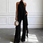 Women's halter-neck draped top and wide-leg ruffled pants set by Yeha Maison, featuring stylish fabric and elegant design.