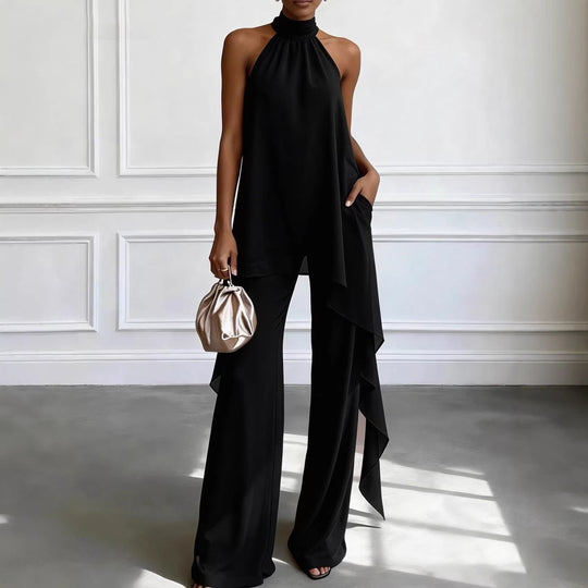 Women's halter-neck draped top and wide-leg ruffled pants set by Yeha Maison, featuring stylish fabric and elegant design.