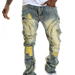 Men's patchwork fringe flared jeans by Yeha Maison, showing detailed patchwork designs and fringed hems on relaxed-fit denim.