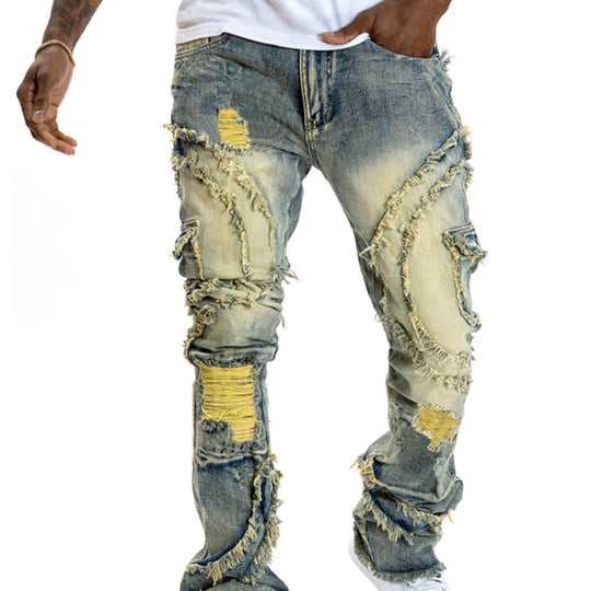 Men's patchwork fringe flared jeans by Yeha Maison, showing detailed patchwork designs and fringed hems on relaxed-fit denim.