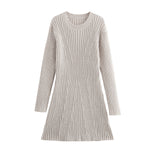 Slim ribbed knit mock-neck A-line mini dress by Yeha Maison, featuring a fitted silhouette and a classic mock-neck design.