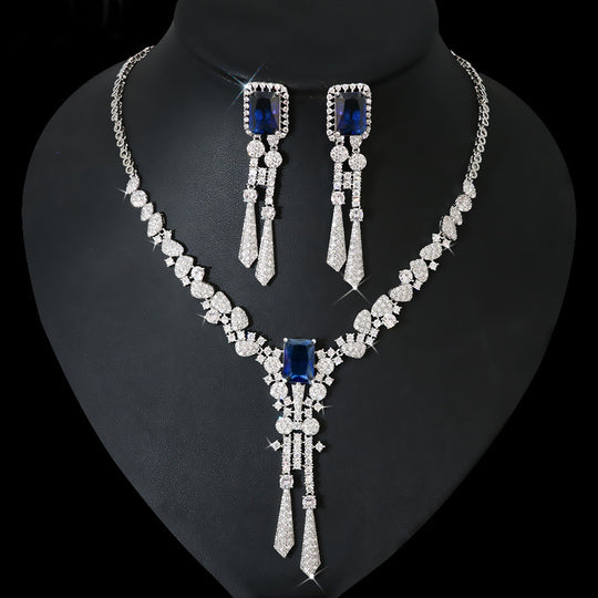 Women's jewelry set featuring a zircon flower necklace and matching earrings from Yeha Maison, with intricate floral design.