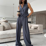 Yeha Maison women's V-neck waistcoat and wide-leg trousers set displayed on a hanger, featuring a stylish, coordinated outfit.