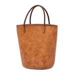 Women's retro cowhide cylindrical messenger bag by Yeha Maison, featuring a stylish leather design with a shoulder strap.