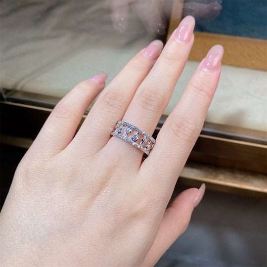 Sterling silver pavé diamond ring by Yeha Maison showing a full band adorned with sparkling small diamonds.