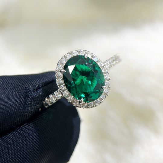 S925 sterling silver diamond oval halo ring with intricate detailing, showcasing a sparkling central gemstone and elegant design.