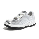 Women's metallic low-top sneakers by Yeha Maison featuring shiny silver finish and casual lace-up design.