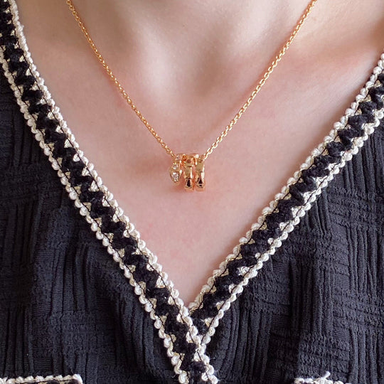 Women's V Gold Snake Chain Statement Necklace by Yeha Maison, showcasing a sleek gold jewelry piece with a V-shaped design.