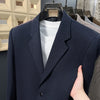 Men's relaxed-fit heavy wool blazer by Yeha Maison, shown in dark gray with notch lapels and tailored fit.