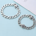 Men's 925 silver rotating skull bracelet, stylish jewelry piece with detailed skull design and polished finish.