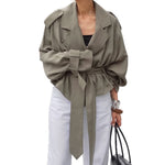 Women's oversized belted wrap trench jacket by Yeha Maison, featuring classic design with a stylish wrap style and belt detail.