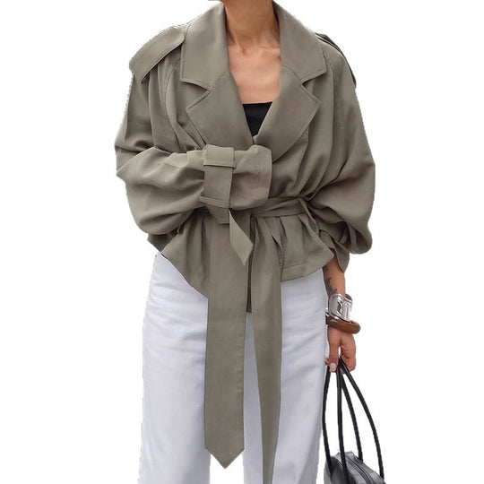 Women's oversized belted wrap trench jacket by Yeha Maison, featuring classic design with a stylish wrap style and belt detail.