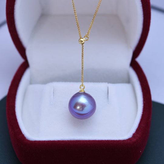 Women's freshwater pearl purple round pendant necklace by Yeha Maison, featuring a elegant purple pearl pendant on a delicate chain.