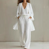 Women's white V-neck open cardigan and wide-leg trouser co-ord set by Yeha Maison, featuring a stylish three-piece outfit.