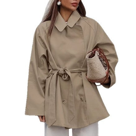 Women's belted drop-shoulder trench coat by Yeha Maison, stylish beige coat with waist belt and classic trench design.