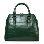 Women's genuine cowhide leather handbag by Yeha Maison, showing the stylish black bag with leather straps and metal accents.