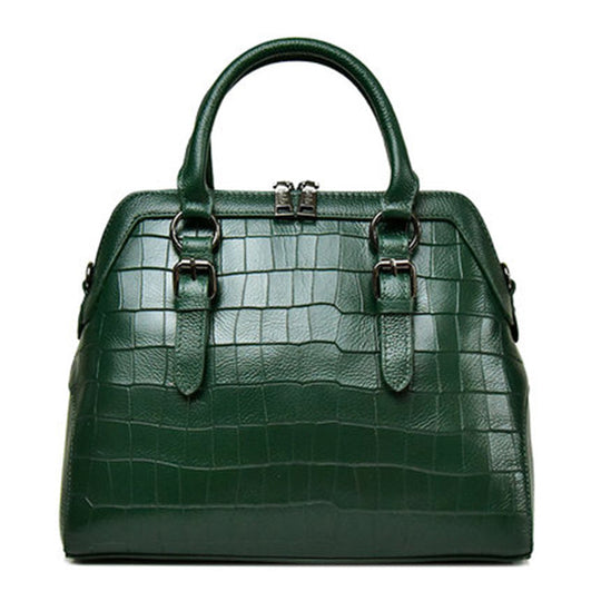 Women's genuine cowhide leather handbag by Yeha Maison, showing the stylish black bag with leather straps and metal accents.