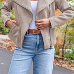 Women's suede asymmetric zip moto jacket by Yeha Maison, featuring a stylish design and zip-up front in a close-up image.