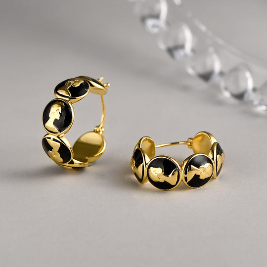 Retro Queen Head metal stud earrings from Yeha Maison featuring vintage-inspired jewelry design with detailed queen face motifs.