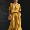 Women's linen-look V-neck button top and A-line maxi skirt set by Yeha Maison, casual and stylish outfit for warm weather.