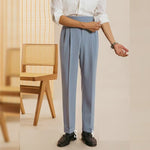 Men's pleated tapered suit trousers with cuffed hem from Yeha Maison, shown in a classic tailored fit with crisp pleats.