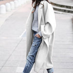 Women's open-front long lapel wool coat by Yeha Maison, showing beige wool fabric and stylish lapel details.