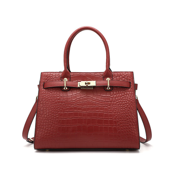 Large capacity women's cowhide leather handbag by Yeha Maison, showing stylish black leather bag with top handles and spacious interior.