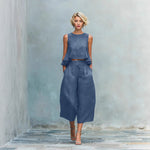 Yeha Maison women's peplum ruffle sleeveless top and wide-leg trouser co-ords set, shown in a stylish, coordinated outfit.