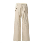 Men's wide-leg pleated snap-waist trousers by Yeha Maison, featuring a relaxed fit and stylish pleats in a neutral fabric.