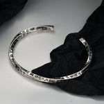 S925 silver Möbius bracelet by Yeha Maison, showcasing a sleek, twisted jewelry design with a smooth silver finish.