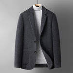 Men's slim-fit houndstooth wool blazer by Yeha Maison, tailored fit with notch lapels and classic pattern, shown on a hanger.