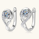 Sterling silver moissanite stud earrings for women, elegant jewelry with sparkling gemstone accents.