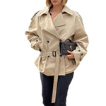 Women's belted double-breasted cropped trench coat by Yeha Maison, featuring a classic design with a belt and button details.