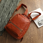 Wax-polished cowhide leather backpack by Yeha Maison featuring sturdy straps and sleek design for everyday use.