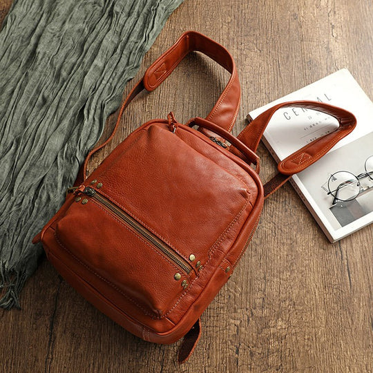 Wax-polished cowhide leather backpack by Yeha Maison featuring sturdy straps and sleek design for everyday use.