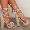 Women's lace-up platform block heel sandals by Yeha Maison, featuring stylish design and open-toe construction.