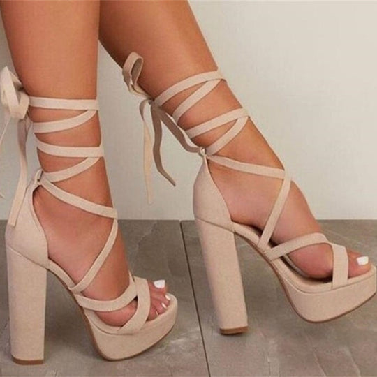 Women's lace-up platform block heel sandals by Yeha Maison, featuring stylish design and open-toe construction.