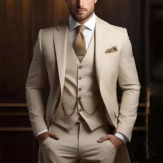 Men's slim three-piece suit with gold chain waistcoat by Yeha Maison, featuring a tailored fit and stylish accessories.