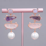 Women's pearl and gemstone small pendant earrings by Yeha Maison with delicate jewelry design and sparkling accents.