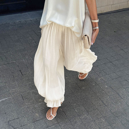 Women's chiffon wide-leg trousers with bubble-hem design from Yeha Maison, featuring flowy fabric and relaxed fit.