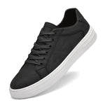 Black embossed leather men's low-top sneaker by Yeha Maison, featuring stylish design and comfortable fit.