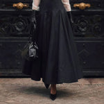 Yeha Maison women's structured shirt and pleated maxi skirt co-ord set, featuring a stylish matching top and flowing skirt.