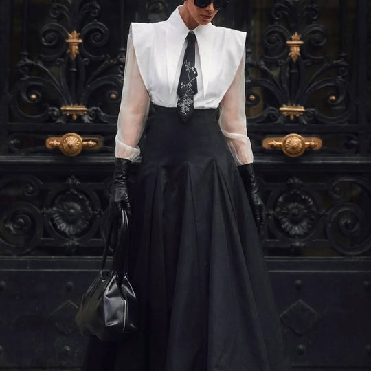 Yeha Maison women's structured shirt and pleated maxi skirt co-ord set, featuring a stylish matching top and flowing skirt.