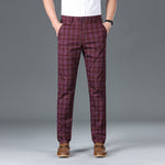 Men's multi-plaid slim straight trousers by Yeha Maison, featuring a tailored fit and classic plaid pattern.