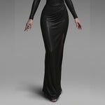 Black women's deep V backless long sleeve maxi dress by Yeha Maison, flowing fabric with elegant open back and fitted sleeves.