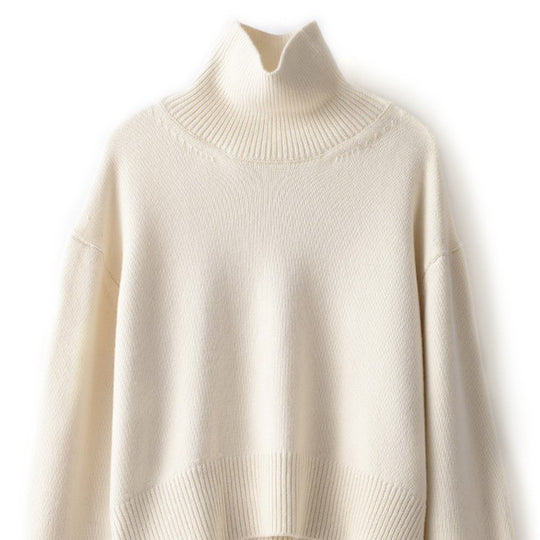 Women's oversized wool pullover sweater with mock-neck from Yeha Maison, shown in soft, cozy fabric and relaxed fit.