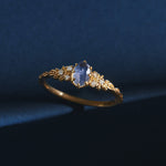 Women's Labradorite Sterling Silver Ring featuring a shimmering labradorite gemstone set in a detailed silver band.