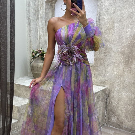Women's one-shoulder tie-dye feather gown by Yeha Maison featuring flowing fabric and a stylish, asymmetrical design.