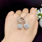 Women’s Moissanite diamond stud earrings by Yeha Maison featuring sparkling gemstone earrings on a white background.